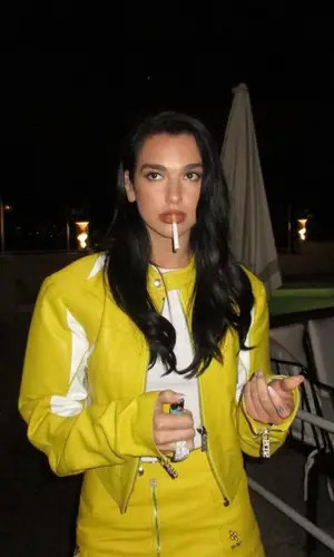 Dua Lipa’s Outfit in GCDS Jacket & Courreges Bag (2023)