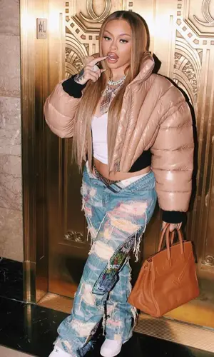 Latto wearing Mugler jacket