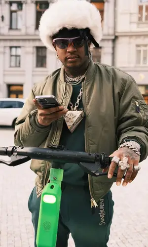 Ski Mask The Slump God’s Outfit in F.M.C.D Jacket, Saint Laurent Sweatshirt & Louis Vuitton Eyewear (2023)