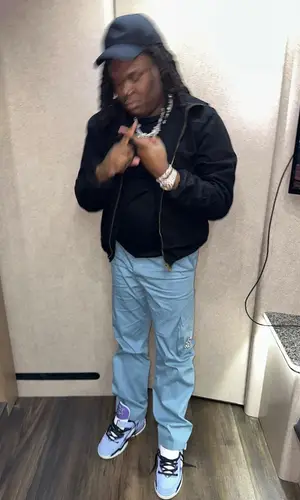 Lucki wearing Louis Vuitton jacket