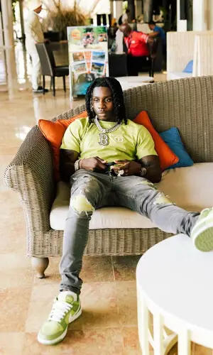 Polo G’s Outfit in Dior T-Shirt, Amiri Jeans & Louis Vuitton Backpack (2023)
