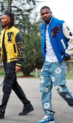 Marcus Thuram wearing Louis Vuitton jacket