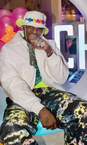 Terry Rozier wearing Louis Vuitton pants
