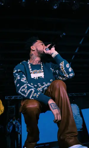 Key Glock wearing Rhude sweater