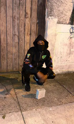 Meek Mill wearing Amiri pants