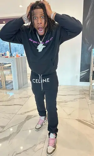 CJ So Cool wearing Travis Scott Merch hoody