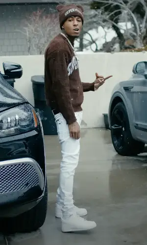 NBA YoungBoy wearing Amiri jeans