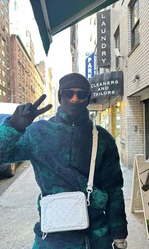 Marcus Rashford wearing Louis Vuitton sweatshirt