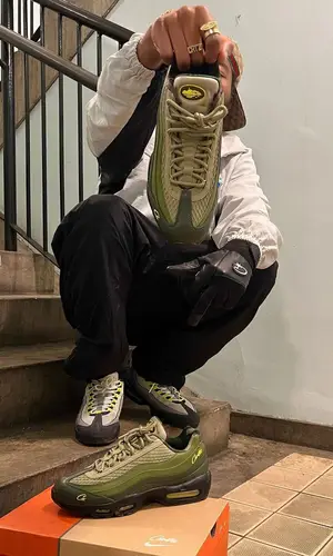 Clint419 wearing Nike sneakers