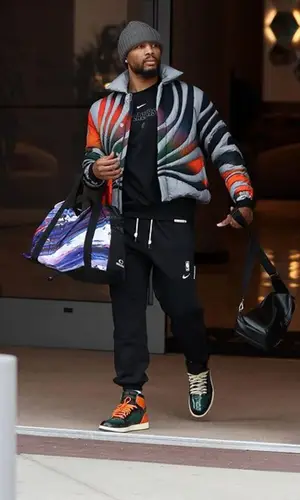 Damian Lillard wearing Nike pants