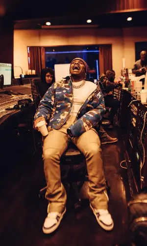 DaBaby wearing Bape jacket