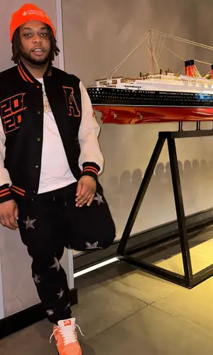 Don Q’s Outfit in Nike Sneakers, Chrome Hearts Hat & Concepts (2023)