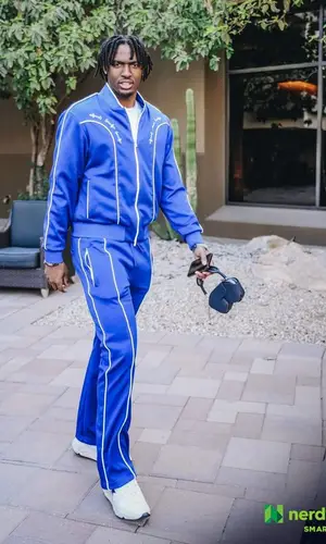Tyrese Maxey’s Outfit in Amiri Jacket & Golden Goose Sneakers (2023)