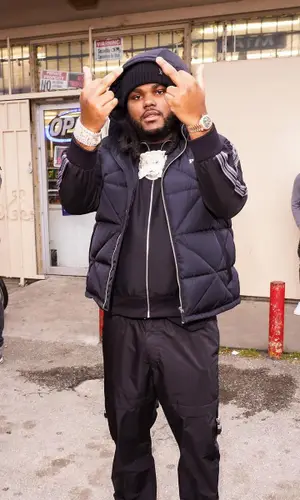Tee Grizzley wearing Prada jacket