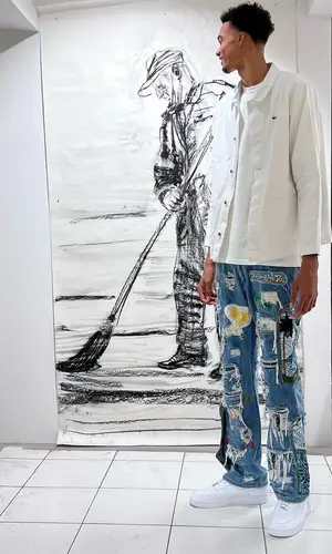 Victor Wembanyama’s Outfit in Nike Jacket & Who Decides War Jeans (2023)