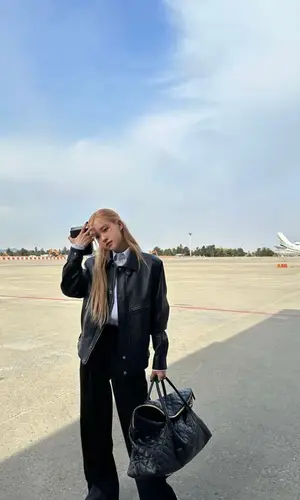 Rose wearing Saint Laurent pants