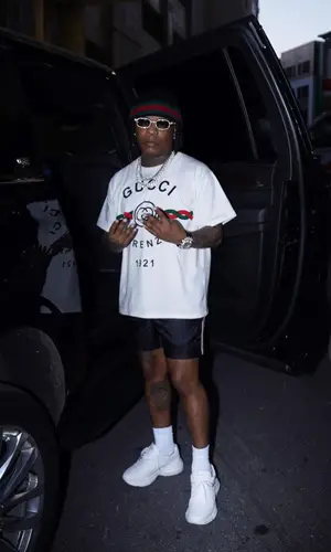 Rylo Rodriguez wearing Gucci swimwear