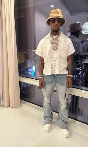 Toosii wearing Alyx boots