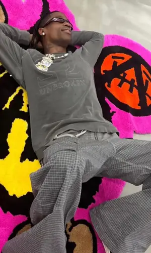 Travis Scott wearing Number (N)ine sweater