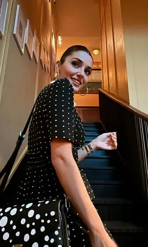 Hande Erchel wearing Louis Vuitton bag