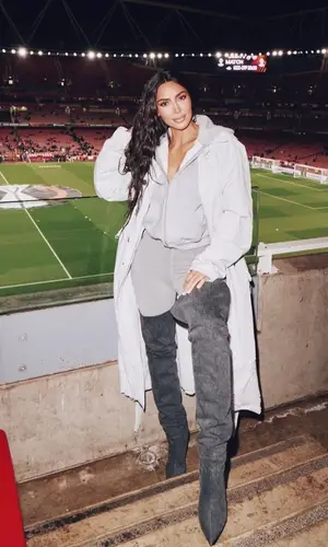 Kim Kardashian wearing Yeezy boots