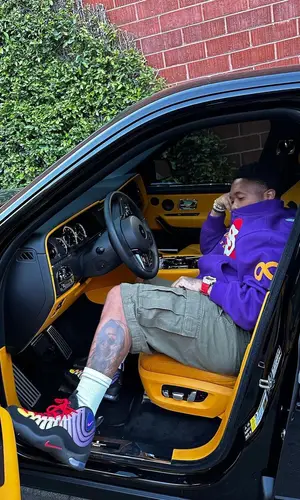 Mustard’s Outfit in Supreme Jacket, Balenciaga Pants & Nike Socks (2023)