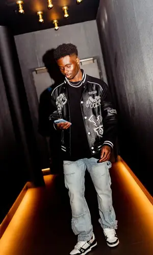 Bukayo Saka wearing Amiri jeans