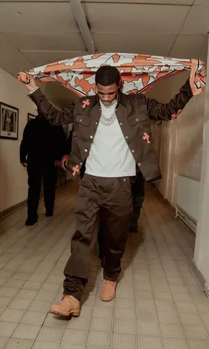 A Boogie Wit Da Hoodie wearing Timberland boots