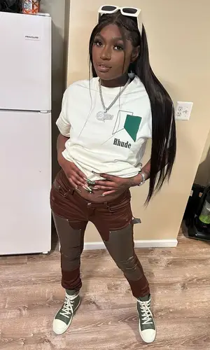 Mello Buckzz wearing Amiri jeans