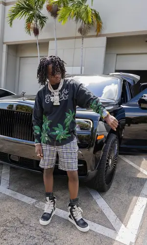 Jackboy wearing Burberry swimwear