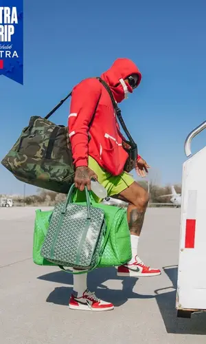 PJ Tucker wearing Louis Vuitton bag