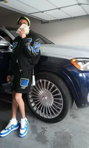Lil Poppa wearing Off-White jacket