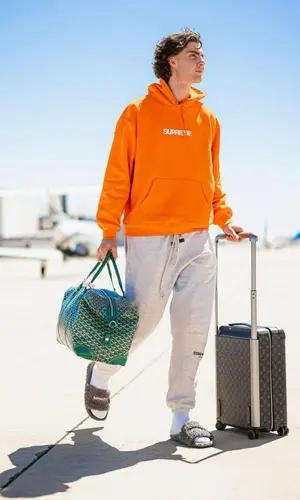 Josh Giddey wearing Supreme hoody