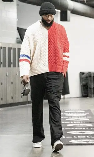 Jaylen Brown’s Outfit in Loverboy by Charles Jeffrey Sweater, Converse Sneakers & Apple (2023)