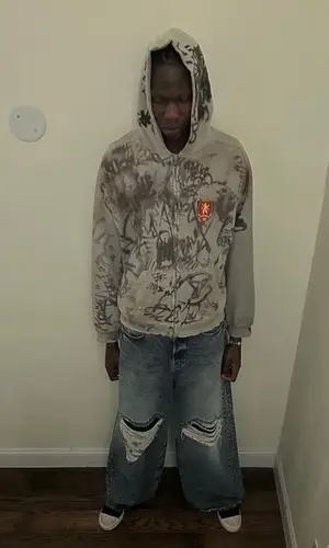 Bol Bol wearing Balenciaga hoody
