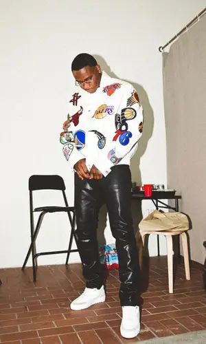 Symba wearing NBA jacket