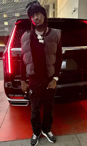 K Camp wearing Askyurself jacket