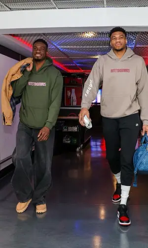 Giannis Antetokounmpo wearing Louis Vuitton bag