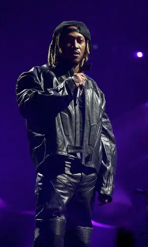 Future wearing Prada boots