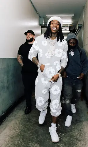 Polo G’s Outfit in Denim Tears Hoodie, Jordan Sneakers & OVO (2023)