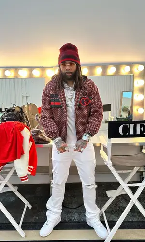 Money Man wearing Gucci hat