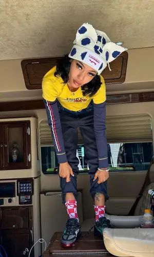 Coi Leray wearing Cactus Plant Flea Market sneakers
