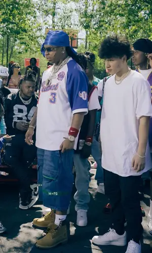 Lil Gotit wearing Marithe + Francois Girbaud shorts