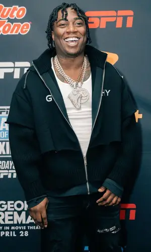 Fredo Bang wearing Amiri jeans