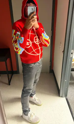 Whereis22 wearing Amiri pants