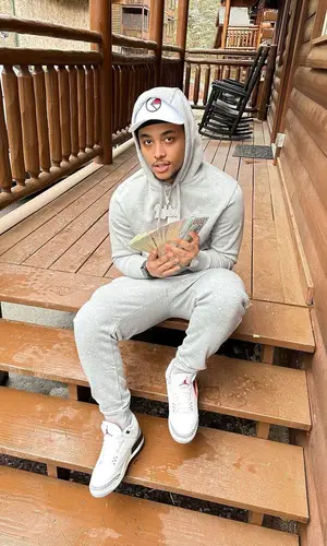Luh Kel’s Outfit in Nike Hoodie, Jordan Sneakers & Ethika Cap (2023)