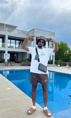 Mowgs wearing Supreme cap