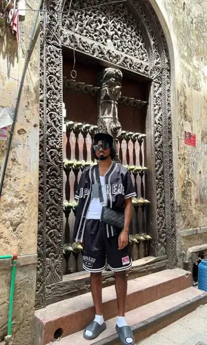 Mowgs wearing Supreme jersey