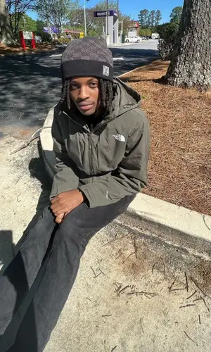 sgpwes wearing The North Face jacket