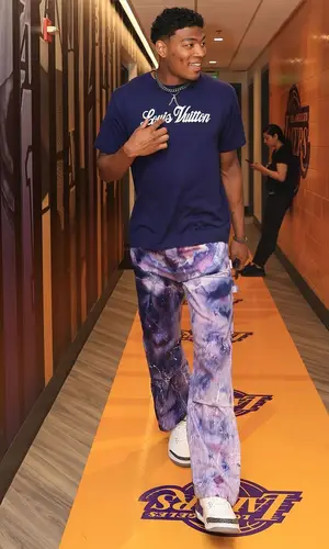 Rui Hachimura wearing Amiri jeans
